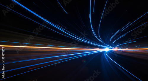 Abstract image of light trails showcasing speed and dynamic movement on road