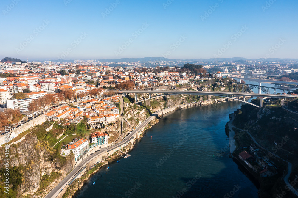Obraz premium Cityscape of the city of Porto, including the Douro river and the Dom Luis I bridge (Ponte de Dom Luís I). Porto, Portugal.