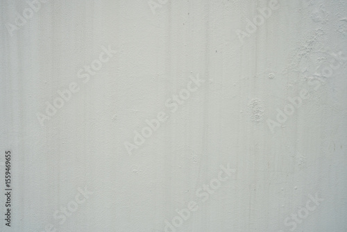 Wallpaper Mural A light, off-white wall with subtle vertical streaks and a slightly weathered texture. Ideal as a minimalist background, offering a clean yet slightly rustic backdrop for various design needs Torontodigital.ca