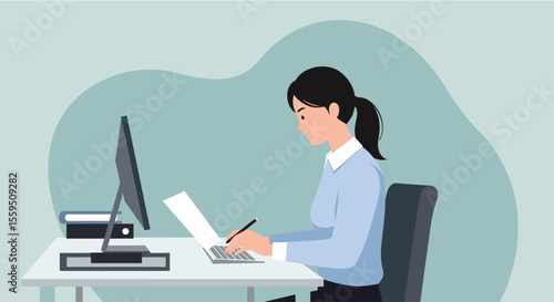 A woman sits at her desk, working on a computer and reviewing documents, in a modern office setting, focused on her tasks and professional responsibilities.