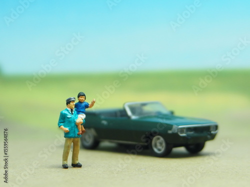 Canvas Print Mini toy of action figure at table with blurred background