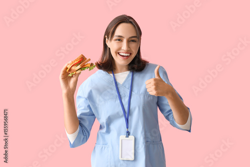 Young female doctor with ta...
