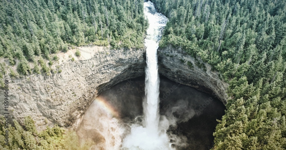 Fototapeta premium Waterfall and forest around a circle