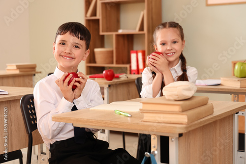 Little schoolchildren with ...