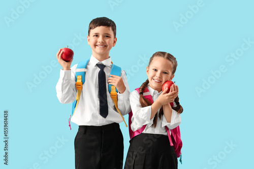 Little schoolchildren with ...