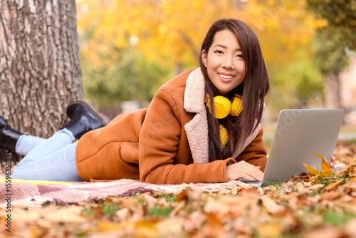 Beautiful young happy Asian...