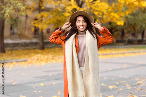 Beautiful young happy Asian...