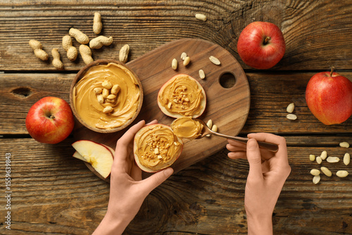 Female hands with apple rou...