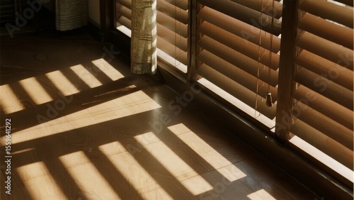 Sunlight Streaming Through Wooden Blinds, Casting Striped Shadows on the Floor