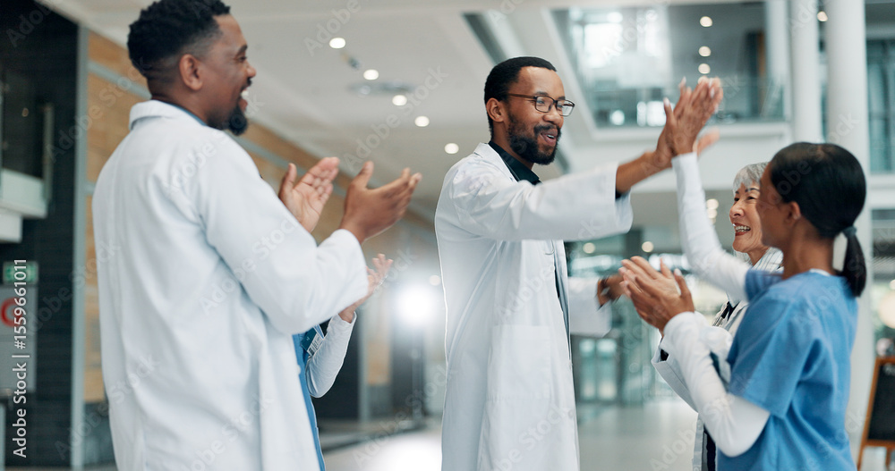 Obraz premium Healthcare, doctor and group with smile, high five or clapping for success, celebration or hospital. Happy, medical professional and applause for achievement in clinic, support and gesture for win