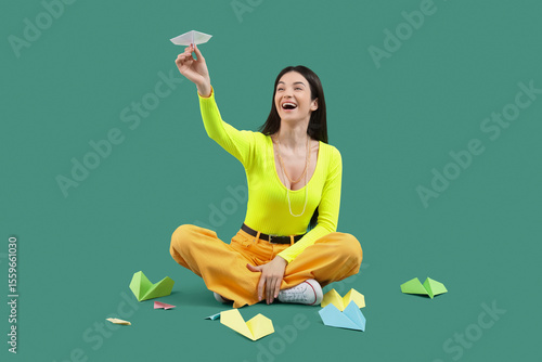 Young woman with paper plan...