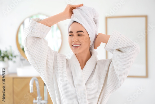 Young woman in white waffle...