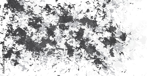 Abstract mottled background with textures of gray and dark shapes splattered against a white backdrop, creating a visually stimulating and unique pattern that evokes a sense of artistic dynamism