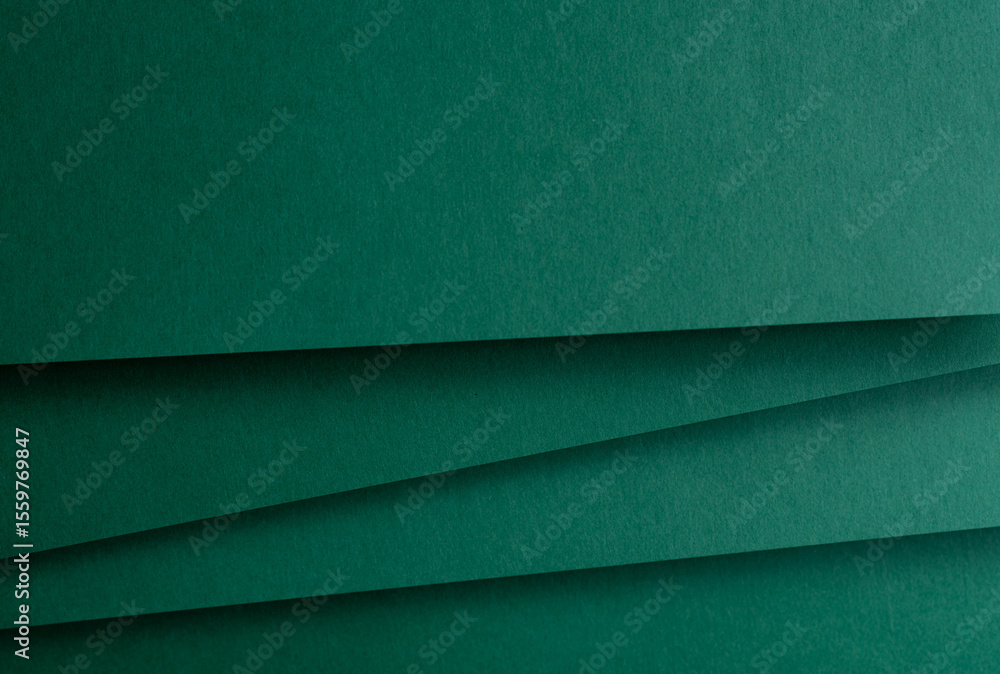 Obraz premium 重なる緑色の画用紙