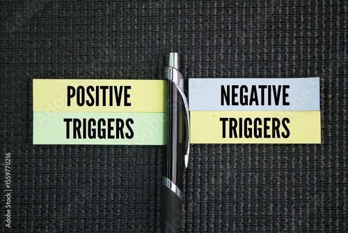 Two words fighting for success Positive Triggers vs. Negative Triggers. stimuli that elicit distinct emotional and behavioral responses.