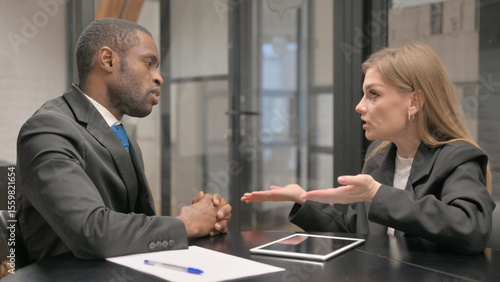 Wallpaper Mural Angry Businesswoman Talking with African Businessman at Work Torontodigital.ca