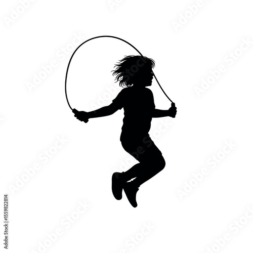 silhouette of a boy jumping on rope