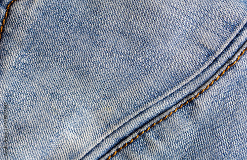 Canvas Print Closeup old blue denim with seam background