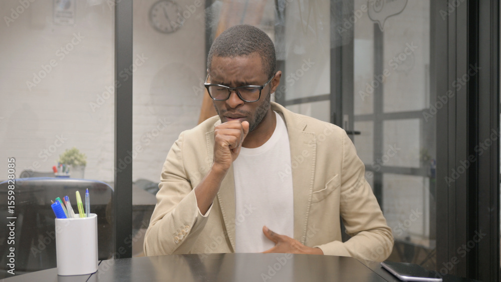 Naklejka premium Portrait of Coughing African Man Feeling Unwell