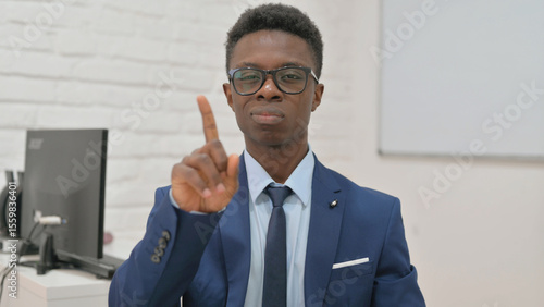 Bild auf Leinwand Young Businessman Showing No Gesture with Finger