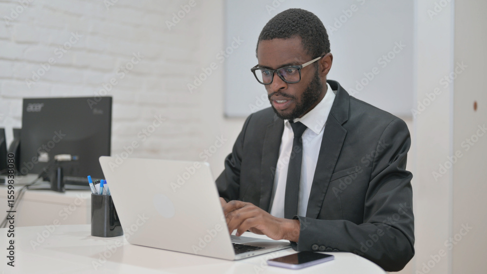 African American Businessman Working on Laptop African American Businessman Working on Laptop