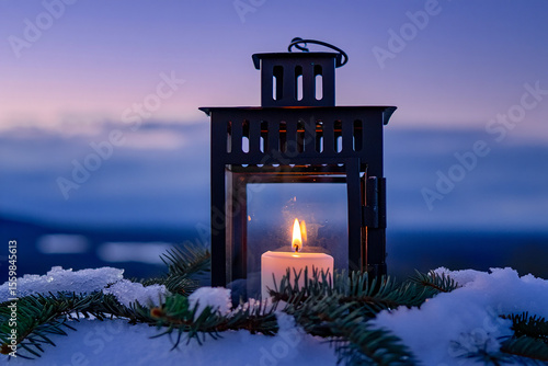 Black lantern with lit candle in snow pine winter