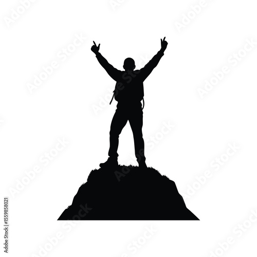 Silhouette of a triumphant hiker standing on a summit with arms raised