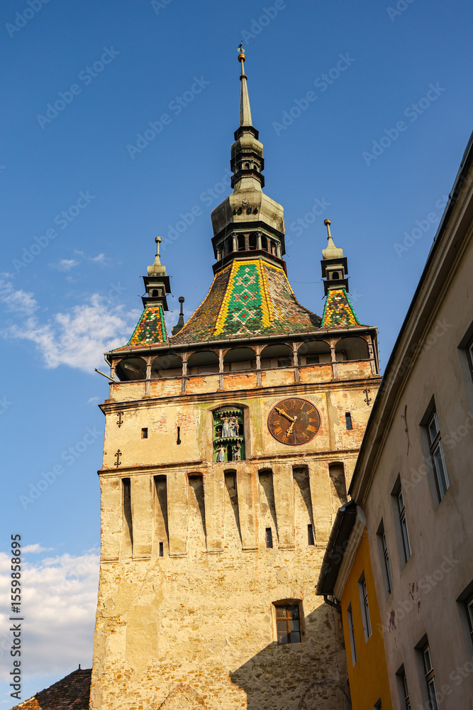 Obraz premium Famous Clock Tower in Historic Sighisoara, Mures County, Romania – Medieval Landmark and Cultural Heritage