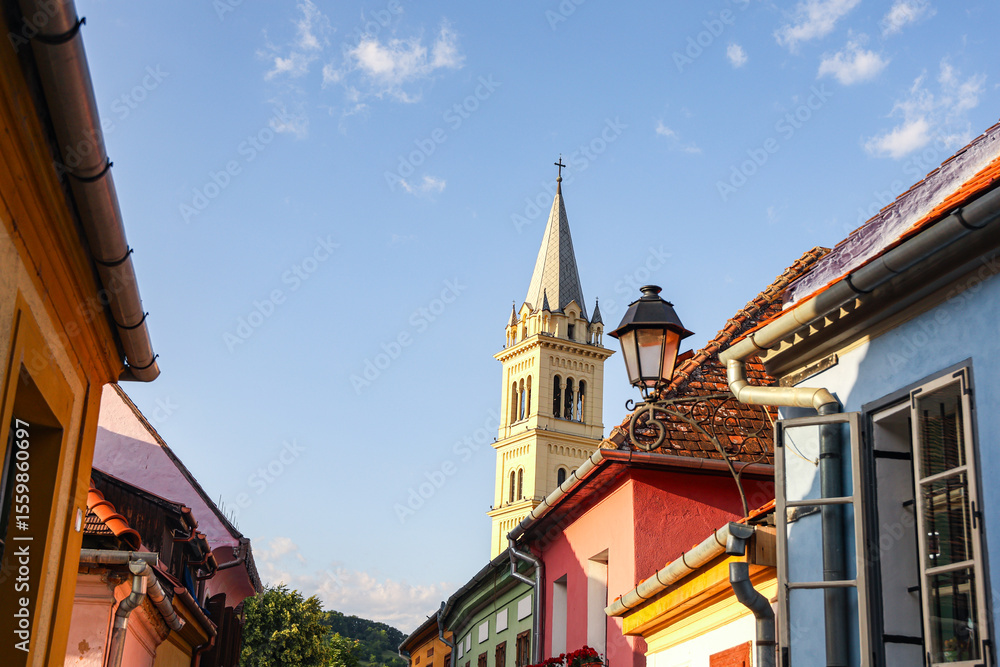 Obraz premium Historic Building in Sighisoara, Romania – Iconic Architecture in Transylvania