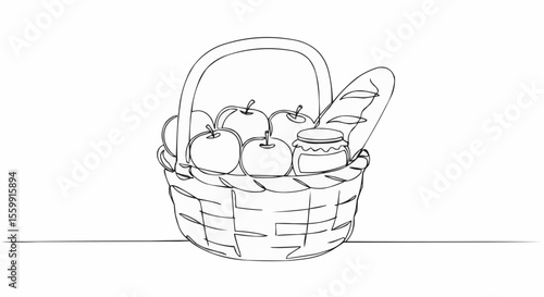 A picnic basket with fruits, bread and jam.