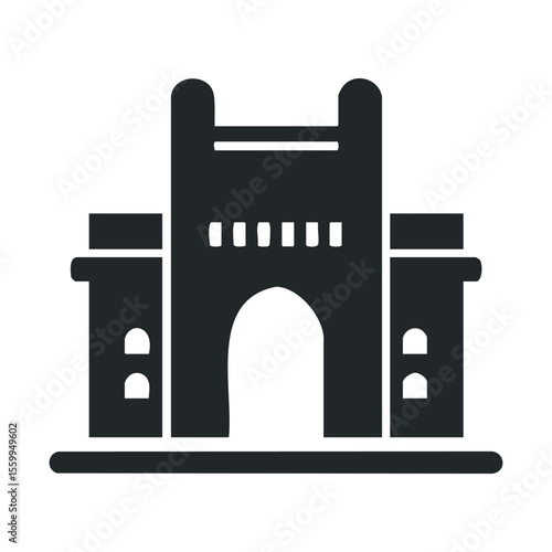 Silhouette of historic medieval fortress gate in monochrome.
