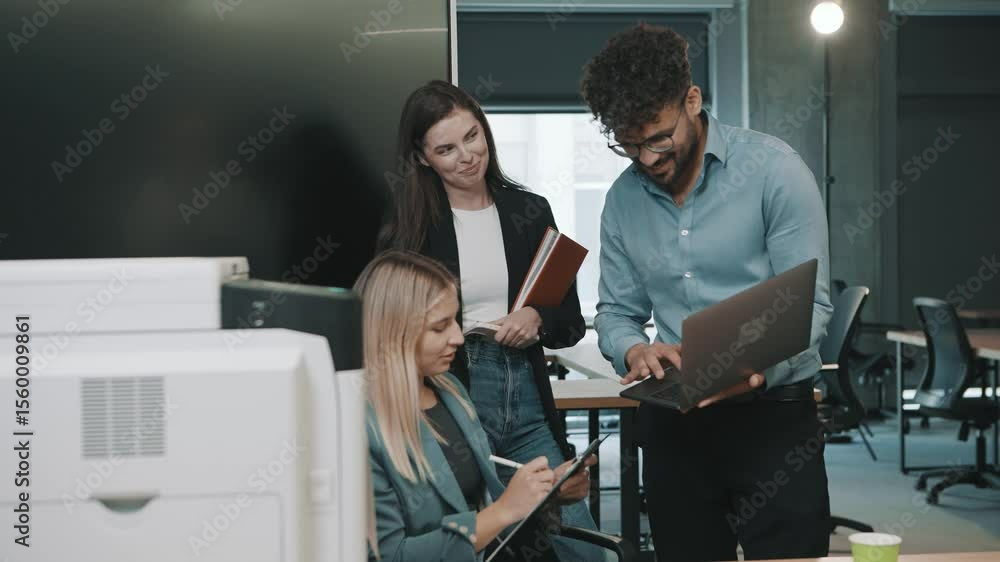 Team collaborates in office setting with slow motion document handling and engaging discussions Team collaborates in office setting with slow motion document handling and engaging discussions