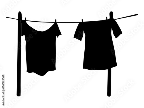 Clothe's hanging from rope full black silhouette vector illustration design