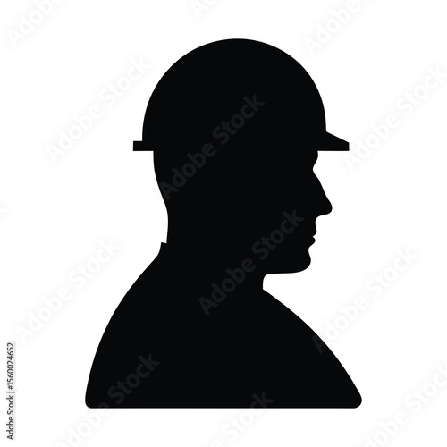 Silhouette of a male worker wearing helmet side profile