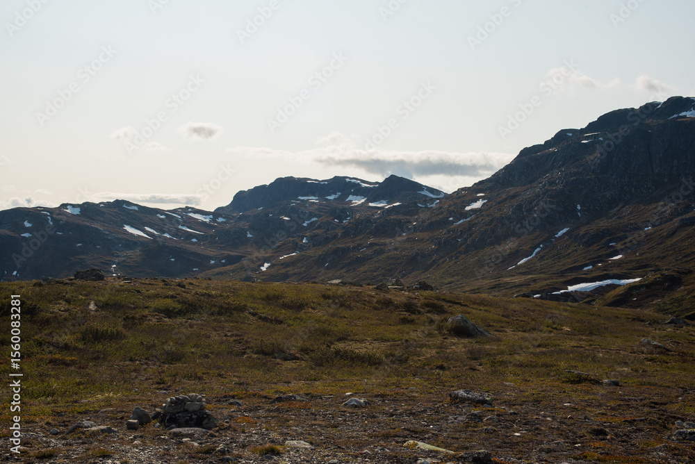 Obraz premium Jotunheimen Landscape with Snowy Mountains