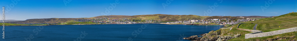 Fototapeta premium A panoramic view of the community of Sound and the town of Lerwick on a clear day in Shetland, UK. 