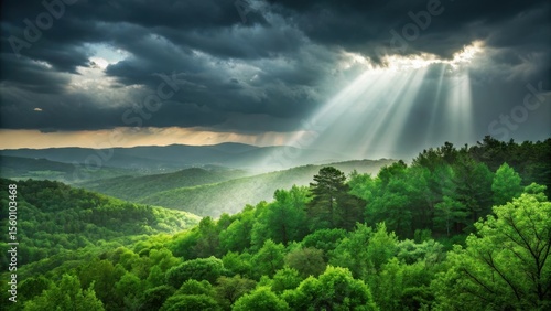Sun rays piercing through dramatic clouds over a lush green mountain landscape, creating a serene and awe inspiring scene