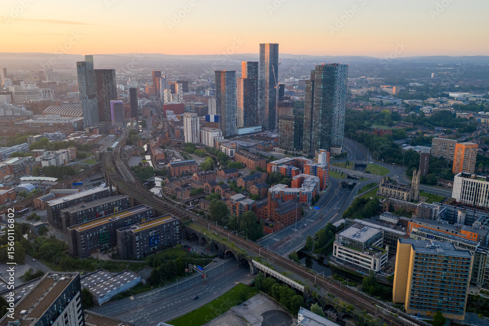 Obraz premium Aerial image of an urban sunrise over the Deansgate area of Manchester UK 