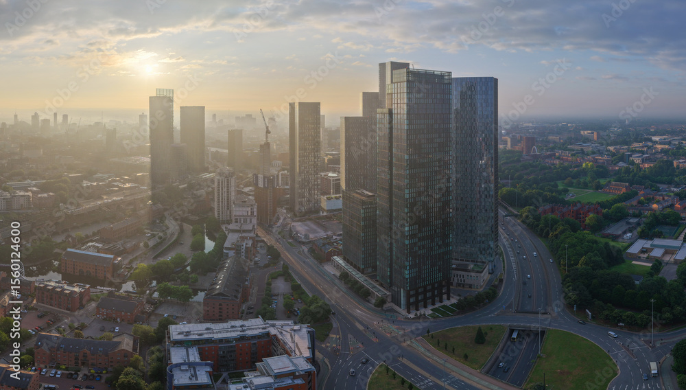 Fototapeta premium Aerial image of an urban sunrise over the Deansgate area of Manchester UK 