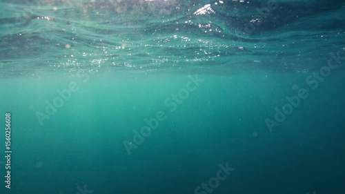 Wallpaper Mural Underwater ocean swell showing the contrast between the moving water surface and the turquoise quiet of the depths below Torontodigital.ca