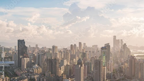 Wallpaper Mural Evening cityscape time lapse showcasing urban buildings and clouds over skyline Torontodigital.ca