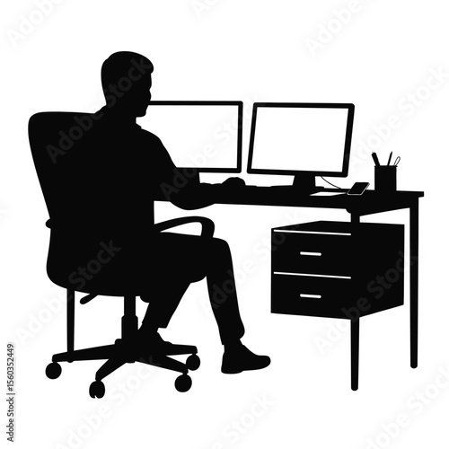 Silhouette of Man Working at Desk with Dual Monitors