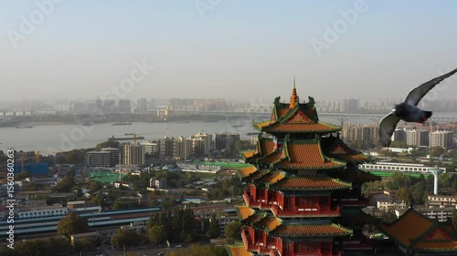 Enjoy breathtaking views from Nanjing Yangtze River Viewing Tower overlooking the city and river at sunset
