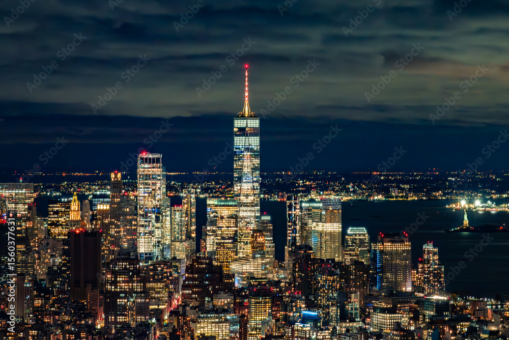 Fototapeta premium Night View from the Empire State Building: One World Trade Center and Illuminated Harbor