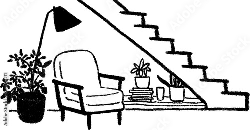 Cozy reading nook under stairs with armchair and plants