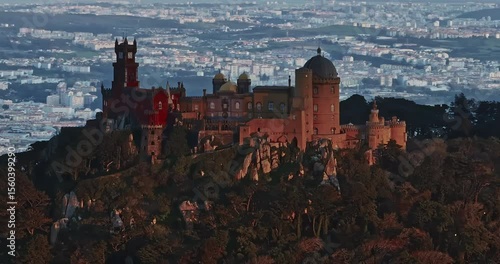 Aerial view of Pena Palace in Sintra with colors at sunset