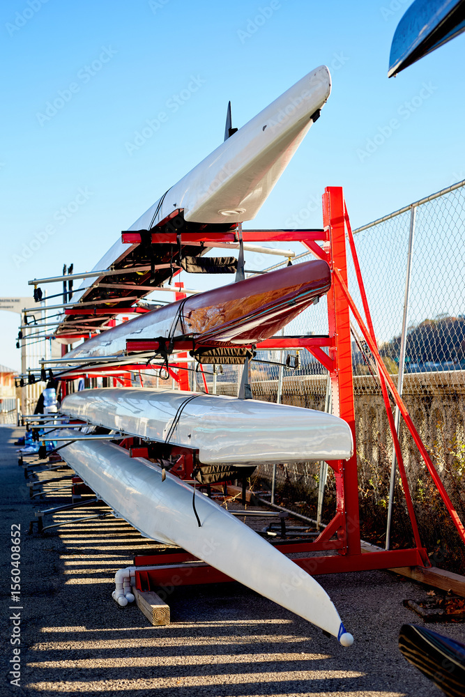 Group of Crew Rowing Boats on a Storage Rack Group of Crew Rowing Boats on a Storage Rack