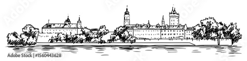 historic cityscape across riverbank