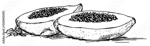 halved papayas with seeds inside