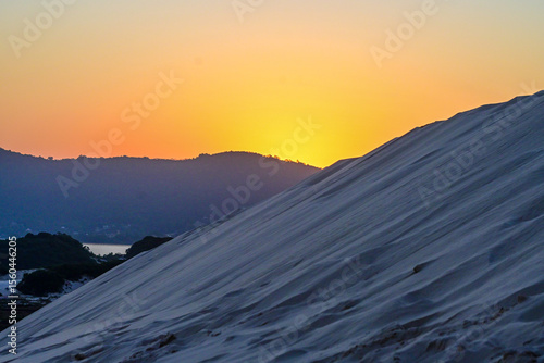 sunset at the two beaches of joaquina in florianopolis santa catarina brazil